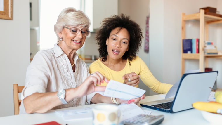 people reviewing utility bills